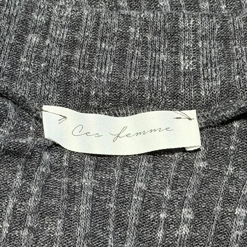 Gray ribbed knit sweater with paisley pattern on sleeves brown striped shoulders
